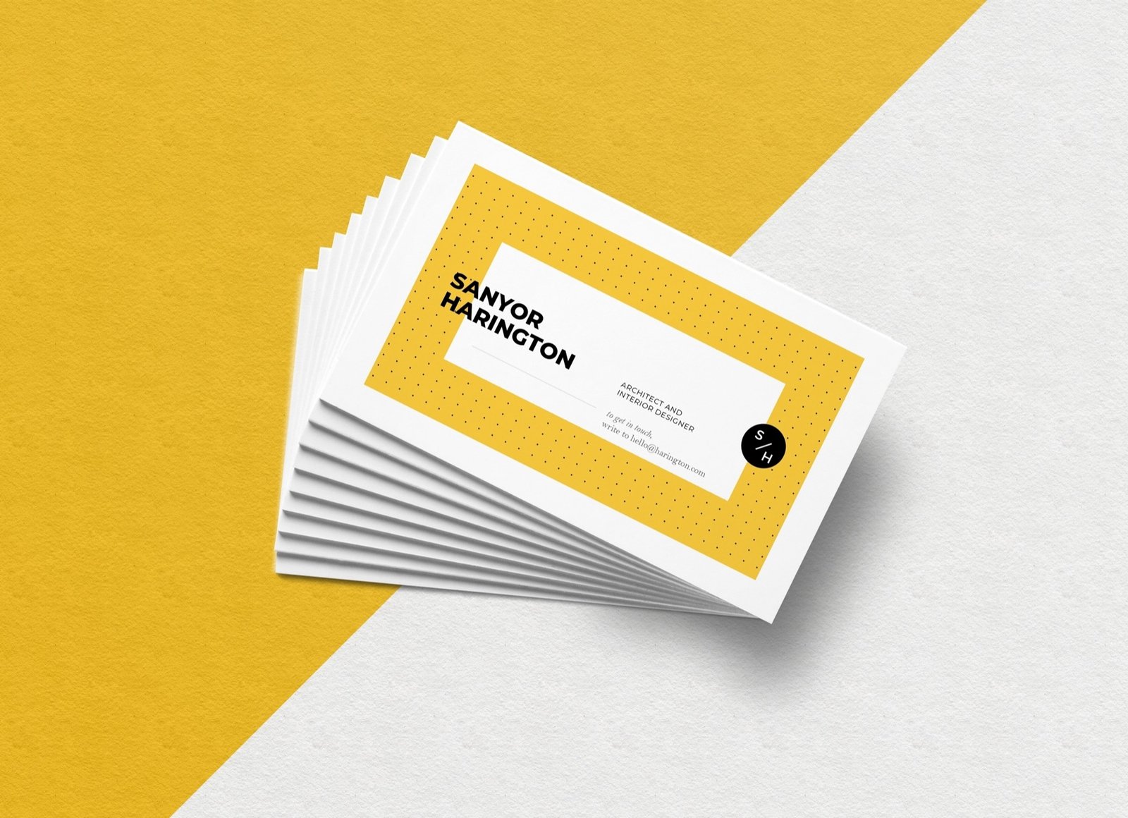 A fanned stack of business cards printed by Copyprint on a yellow and grey backdrop